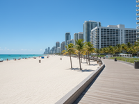 Miami Beach boardwalk with turquoise ocean