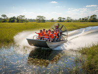 Tourists on airboat through Everglades